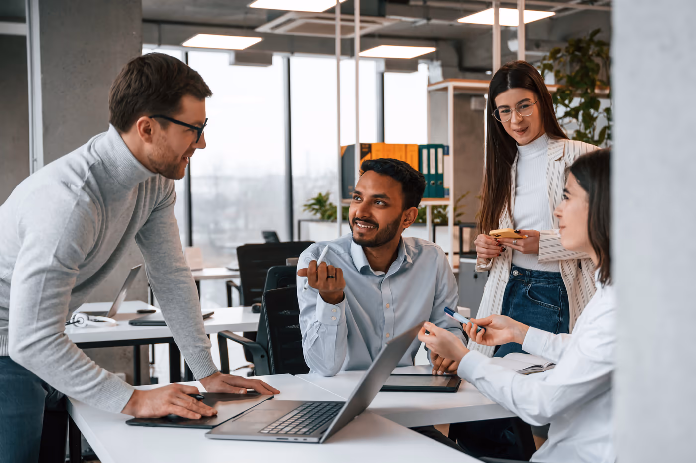 The Riz Finance team working with a client